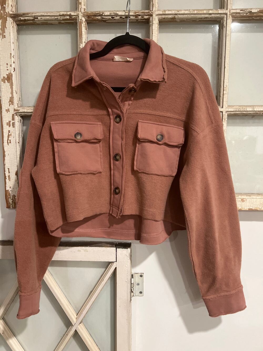 Altar'd State size small cropped fleece jacket in a light pink/mauve color